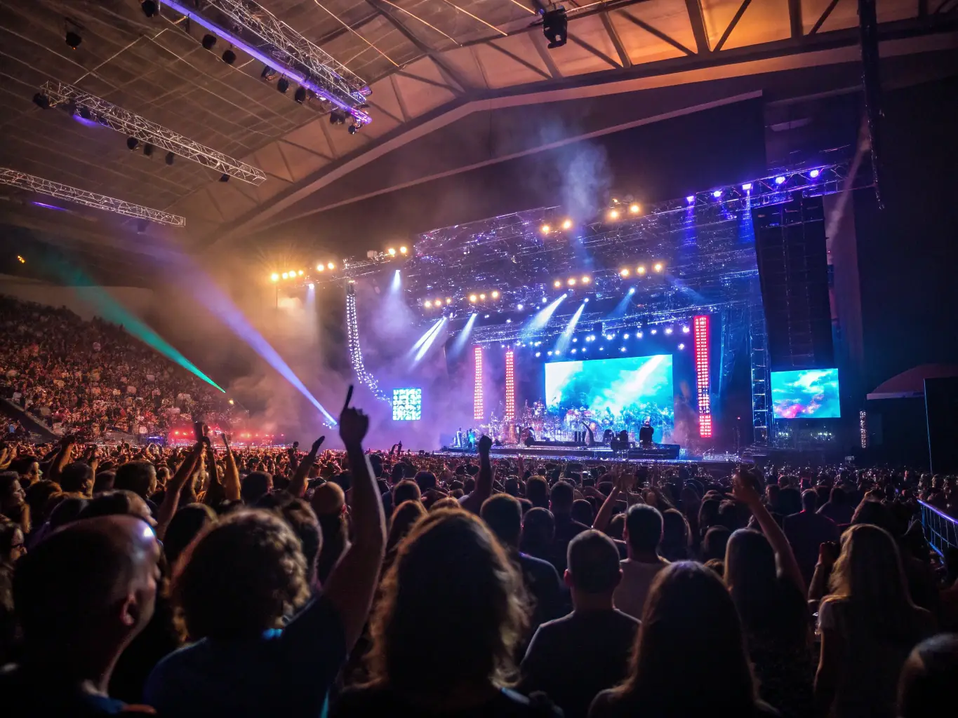An image of a vibrant live performance with an engaged audience, showcasing the energy and diversity of our cultural events.